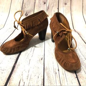 Moccasin lace front heels